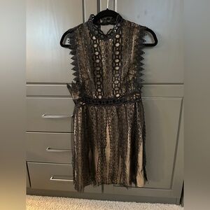 Free People- Cute and original black lace backless halter dress